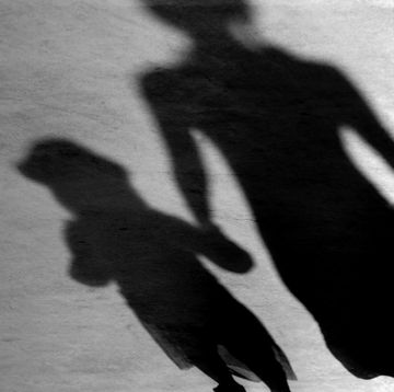 mother child shadows walking